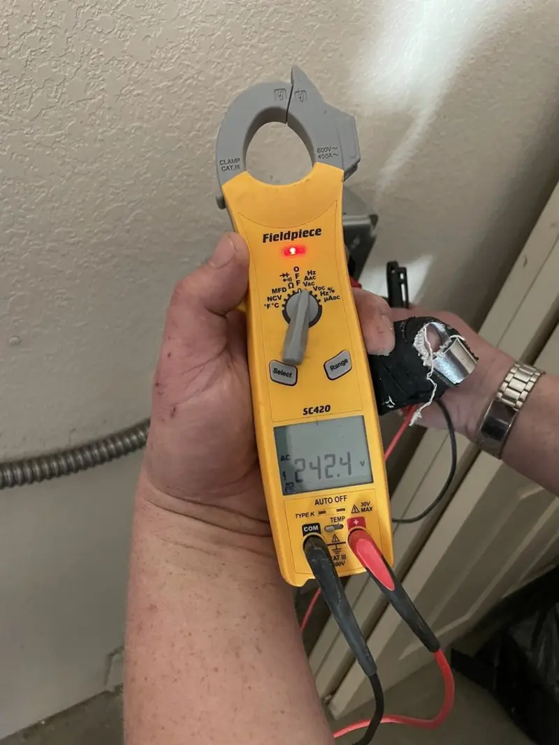 Voltage testing with clamp meter during Hot Tub / Pool Electrical Wiring in Wellington